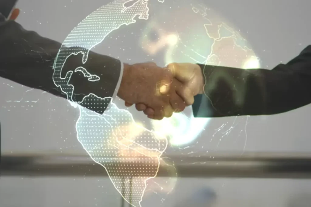 Strategic partnership handshake for global audience connection through localization services.
