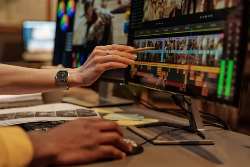 Linguist analyzing audio timeline for precise frame-accurate subtitling synchronization.