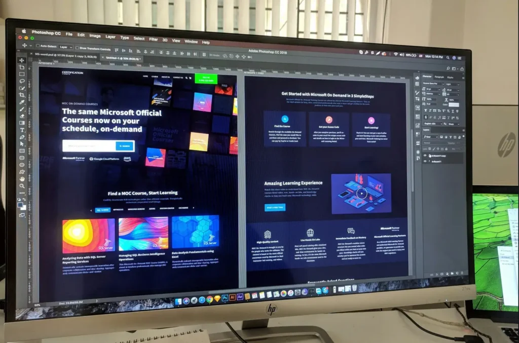 A modern developer workspace with multiple monitors and code editors, representing specialized software localization services.